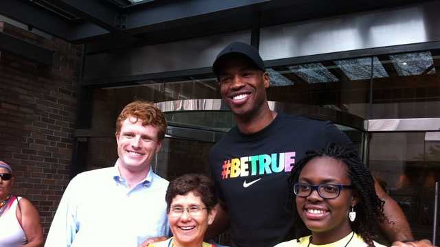 NBA star Jason Collins poses with former college roommate and Rep. Joe Kennedy before Boston’s Pride Parade on Saturday, June 8, 2013.