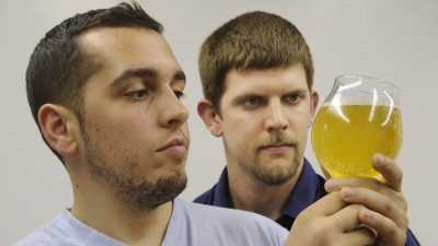 Jeremy Quaglia, left and Kyle Schmitt inspect their product.
