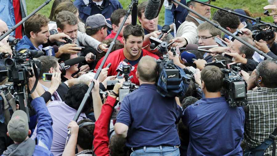 Dozens of cameras and extra reporters flooded what is a routine off-season New England Patriots workout.