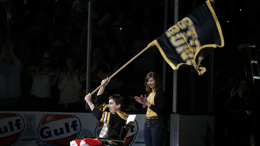 Boston Marathon bombing victim Jeff Bauman waves a Boston strong flag before game two of the first round of the 2013 Stanley Cup playoffs against the Toronto Maple Leafs at TD Garden on May 4, 2013. 