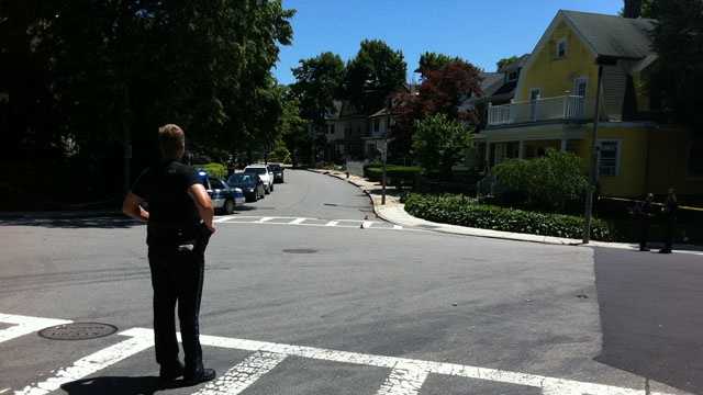 Police investigating the scene of a fatal shooting on Wellington Hill Street in Mattapan on Saturday, June 15, 2013.
