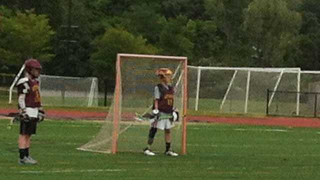 After receiving his prosthetic leg, Matthew Freitas returns to the field as goalie on June 16, 2013.