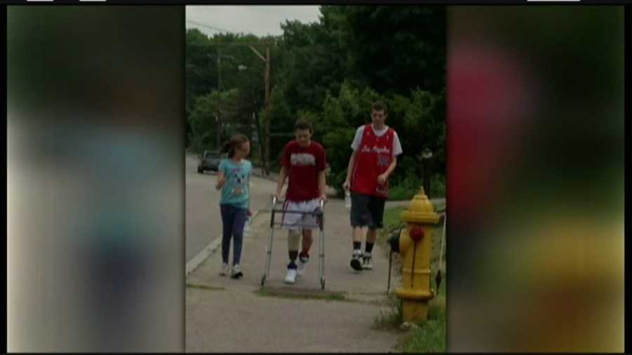 A young lacrosse player is back on the field after losing part of his led in a crash.