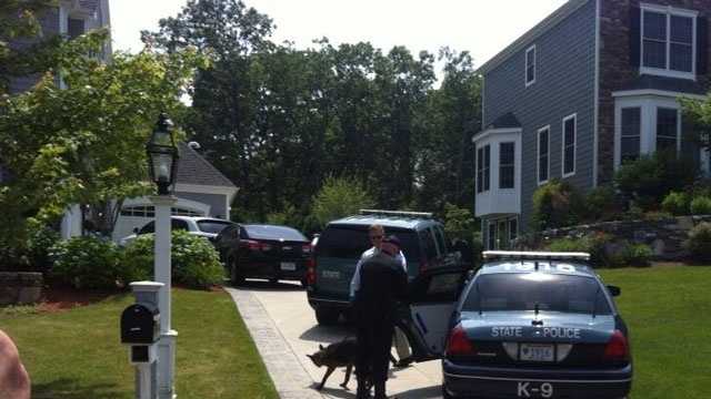 A K9 crew arrives to the home of Aaron Hernandez on Saturday, June 22, 2013.