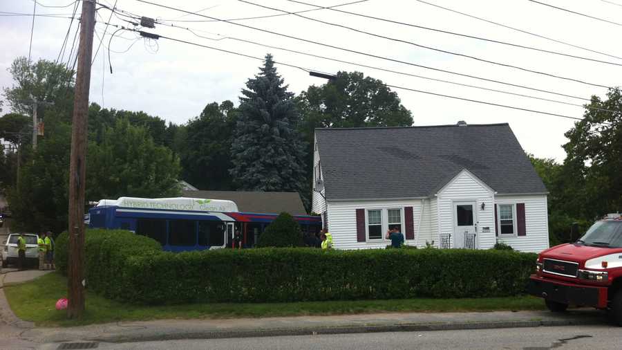 A bus crashed into a home in Auburn on Monday.