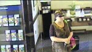 Security camera photo of a woman who robbed the Eastern Bank on Franklin Street in Quincy on Wednesday, June 26, 2013.