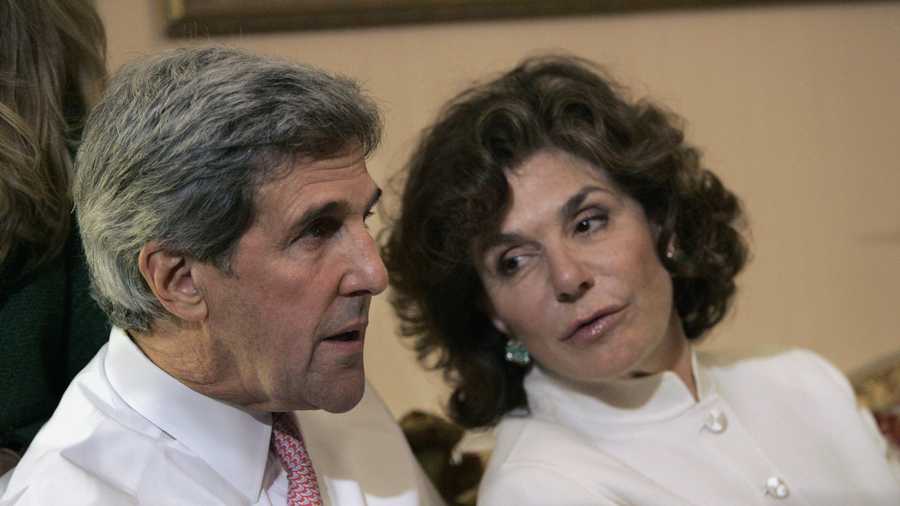 Sen. John Kerry, D-Mass, left, talks with his wife Teresa Heinz Kerry while watching election results at a hotel in Boston, Tuesday, Nov. 4, 2008,