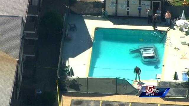 Images: SUV crashes into pool