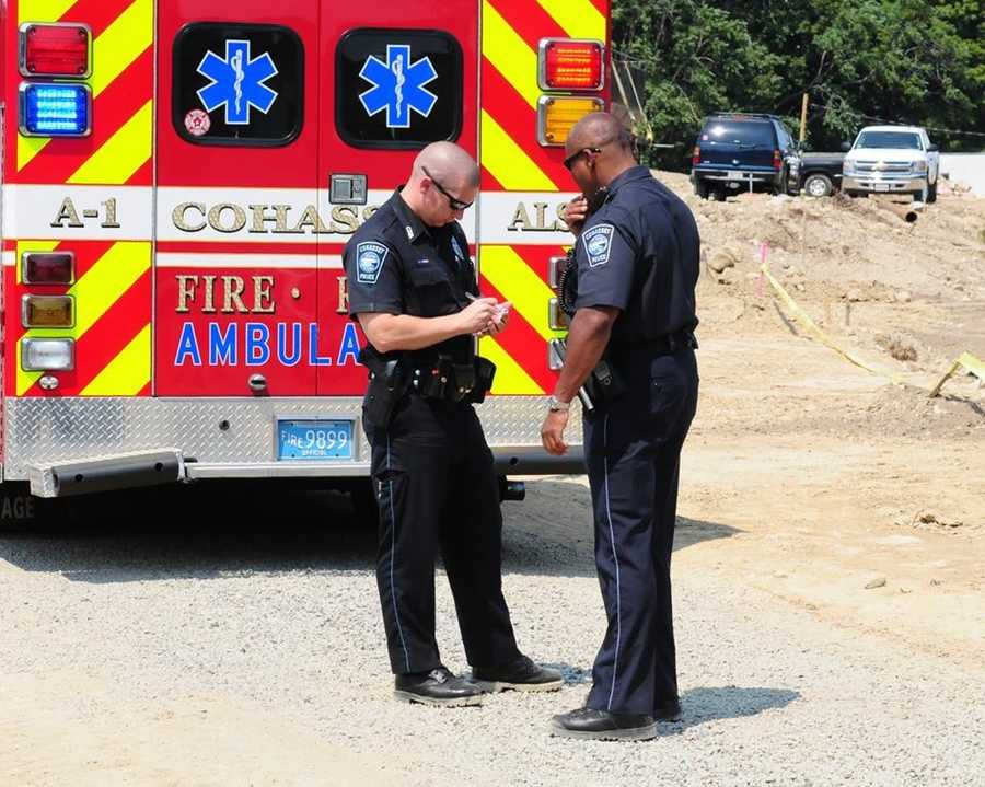 Photos Driver injured after dump truck tips over