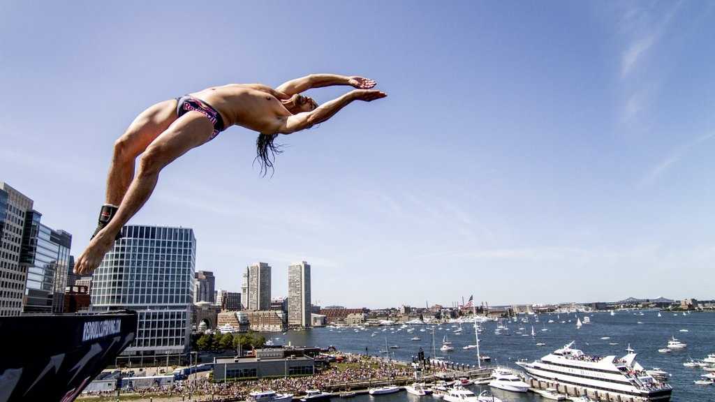 Divers jump from 90 feet above Boston Harbor