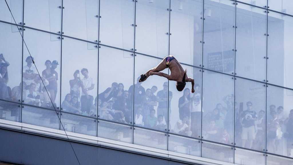 Divers jump from 90 feet above Boston Harbor