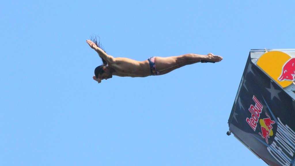 Divers jump from 90 feet above Boston Harbor