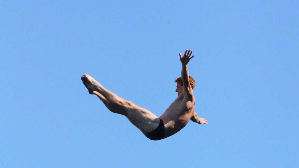 Divers jump from 90 feet above Boston Harbor