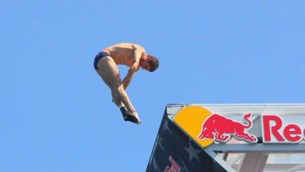 Divers jump from 90 feet above Boston Harbor