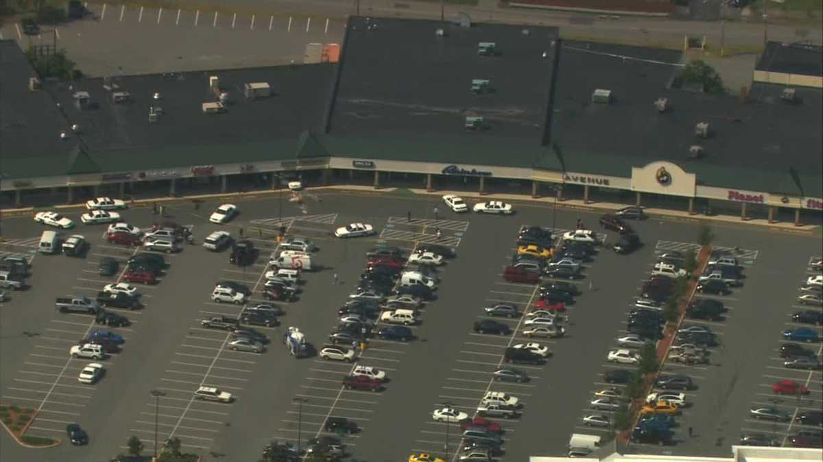 Images: Car crashes into shopping plaza