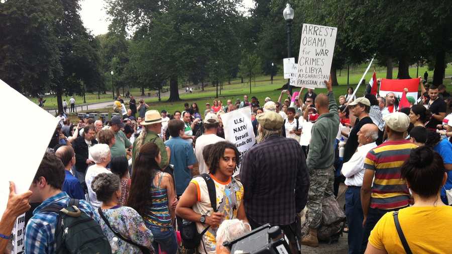 Protesters opposing U.S. and NATO military action in Syria rally on Boston Common on Aug. 31, 2013.