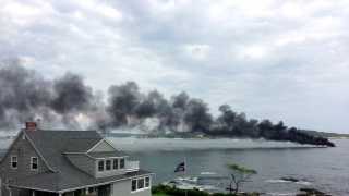 Photos: Boat catches fire in Portland Harbor