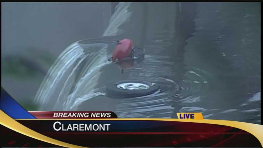 A pickup truck was submerged in the Sugar River in Claremont early Friday morning.