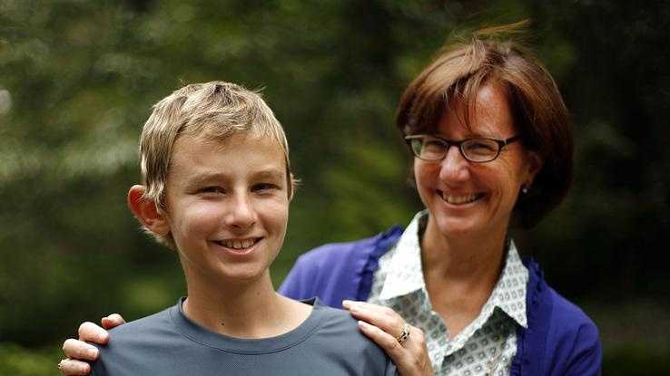 Jack Robinson, 13, of Milton, shown with his mother, Tisa, self-published “Make ’Em Laugh,” a book of jokes for kids. He underwent treatment for bone cancer at the Jimmy Fund Clinic in Boston. The photo was taken on Monday. Aug. 26, 2013.