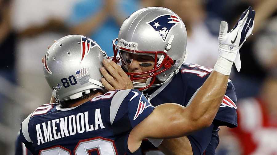 New England Patriots wide receiver Danny Amendola (80) runs from Buffalo Bills safety Duke Williams (27) after catching a pass in the second half of an NFL football game, Monday, Nov. 23, 2015, in Foxborough, Mass.