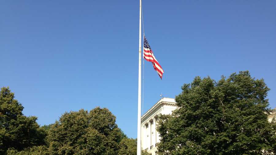 The flag is lowered at the Statehouse.