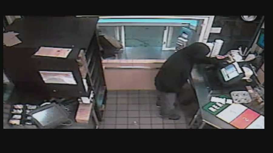 Boston police were searching for a person Wednesday after an armed robbery at a Dunkin' Donuts.