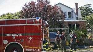 Neighbor alerts homeowner to fire, saves dog