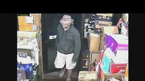 Lawrence police are searching for a man who robbed a liquor store Thursday.