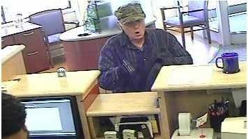 The man entered East Boston Savings Bank at 2172 Massachusetts Ave. shortly after 9 a.m., police said. As he approached the tellers, he pointed a black pistol at them and violently threatened to harm them if they did not comply with his demand for money. 