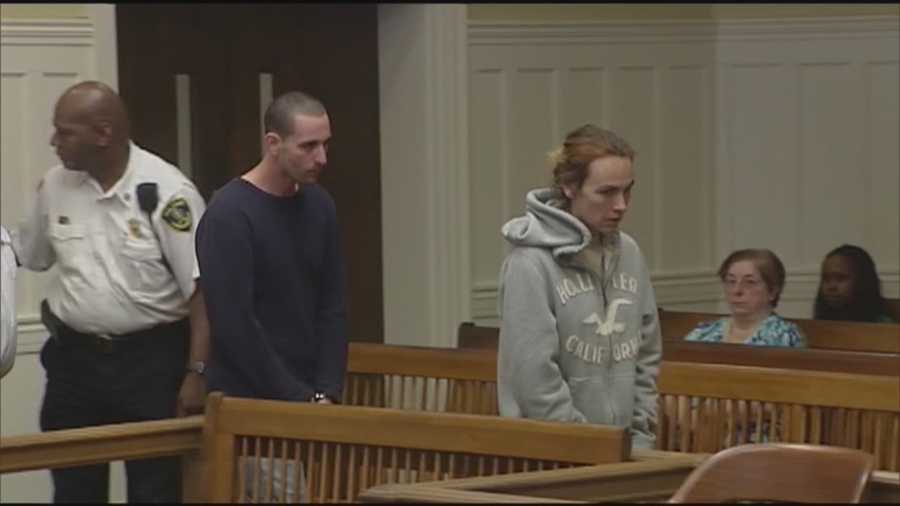 A couple accused of killing their 5-month-old daughter by giving her a bottle of formula with heroin in it were charged with manslaughter on Friday.
