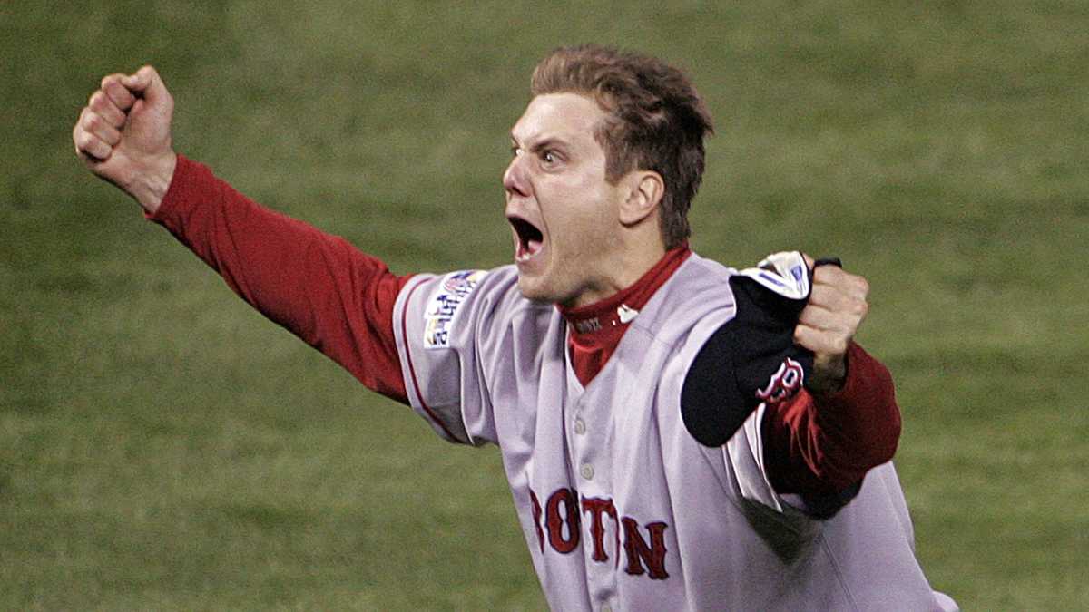 Boston Red Sox pitcher Jonathan Papelbon, left, and catcher Jason Varitek  celebrate after the Red Sox beat the Colorado Rockies, 4-3, to win the  baseball World Series Sunday, Oct. 28, 2007, at