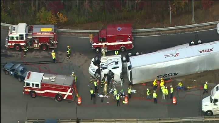 Driver rescued from tractor-trailer after crash