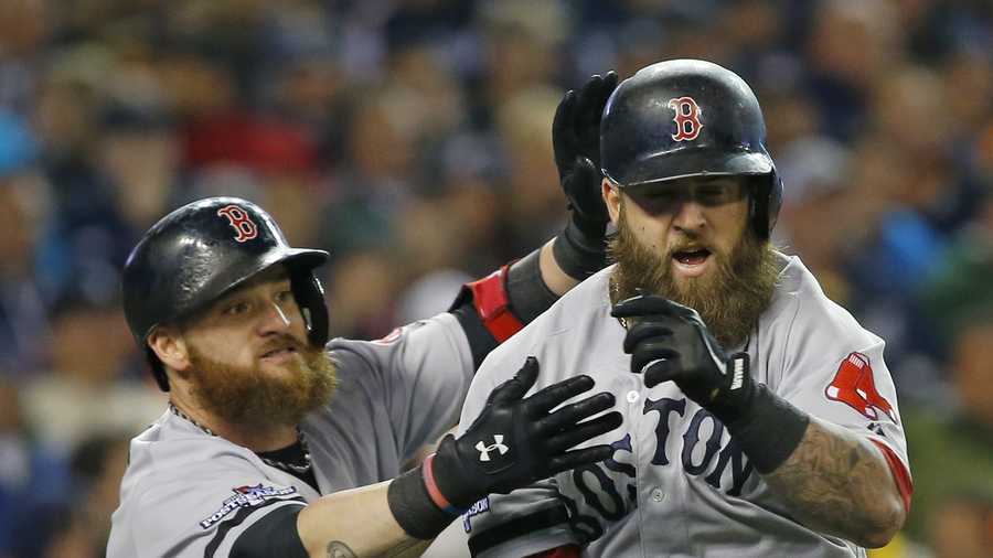 An obvious imposter tried to pose as a beardless Mike Napoli in the Red Sox  dugout right?