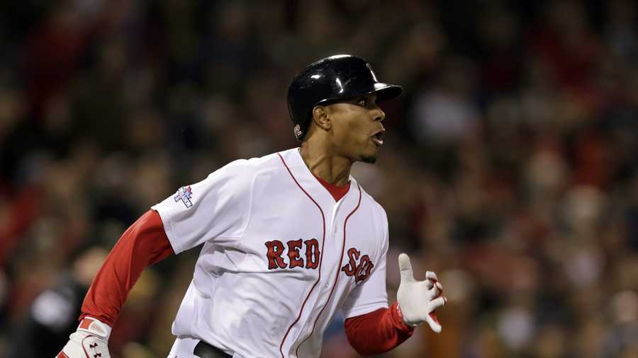 Boston Red Sox's Xander Bogaerts watches his double off Detroit Tigers starting pitcher Max Scherzer in the fifth inning.