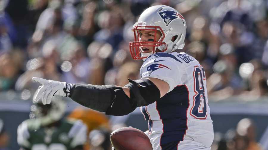 New England Patriots tight end Rob Gronkowski (87) gestures after a play during the first half of an NFL football game against the New York Jets Sunday, Oct. 20, 2013 in East Rutherford.