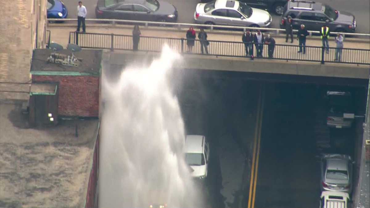 Photos show geyser of water from pipe break