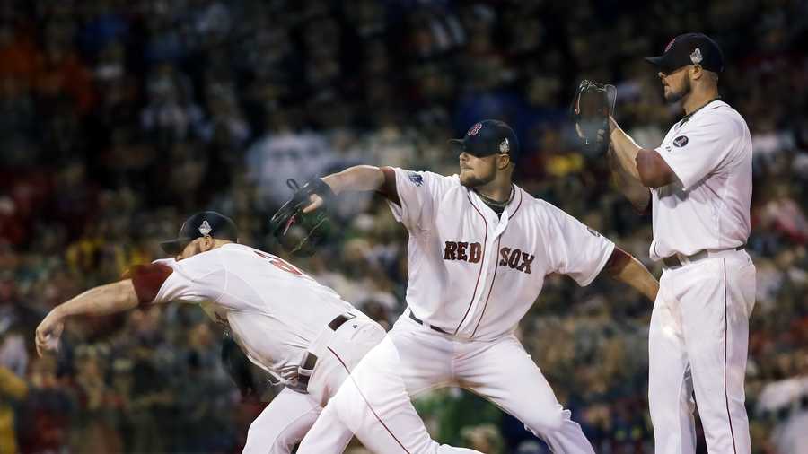 This multiple exposure image shows Boston Red Sox starting pitcher Jon Lester throwing during the seventh inning of Game 1 of baseball's World Series against the St. Louis Cardinals Wednesday, Oct. 23, 2013, in Boston.