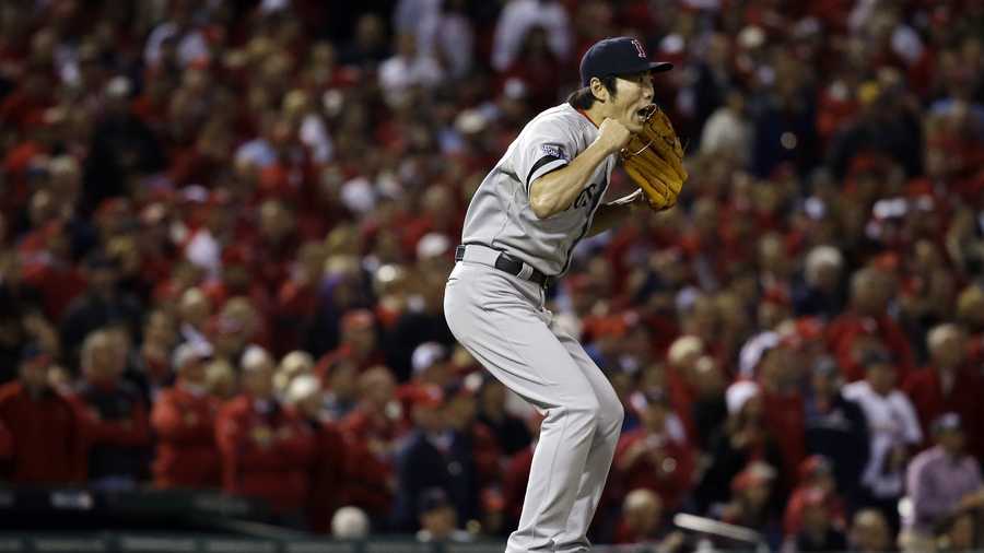 Boston Red Sox relief pitcher Koji Uehara reacts after getting St. Louis Cardinals' Matt Holliday to fly out and end Game 5 of baseball's World Series Monday, Oct. 28, 2013, in St. Louis. The Red Sox won 3-1 to take a 3-2 lead in the series. 