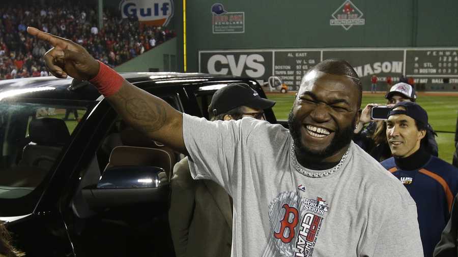 Boston Red Sox designated hitter David Ortiz laughs after being named the MVP after Game 6 of baseball's World Series Thursday, Oct. 31, 2013, in Boston. The Red Sox won 6-1 to win the series. 