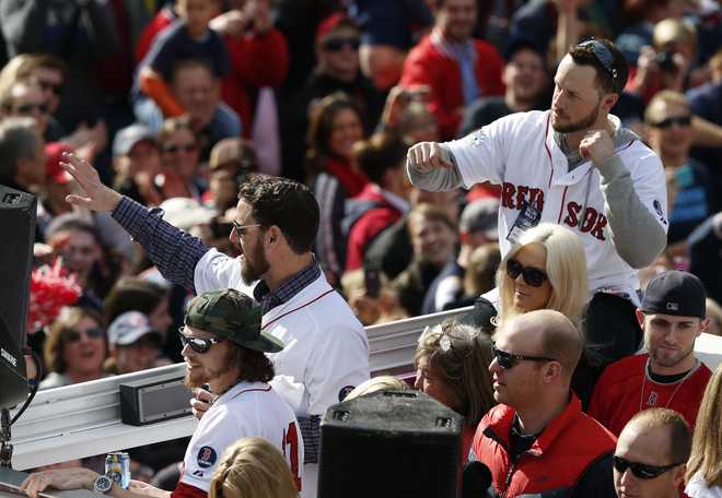 Boston Red Sox fans celebrate latest World Series title; parade on