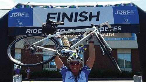 Wendy Lampro, of Otis, rides her bike in races all over the United States in order to raise money to fight Type 1 diabetes. Her sister died of complications from the disease in 2003. 