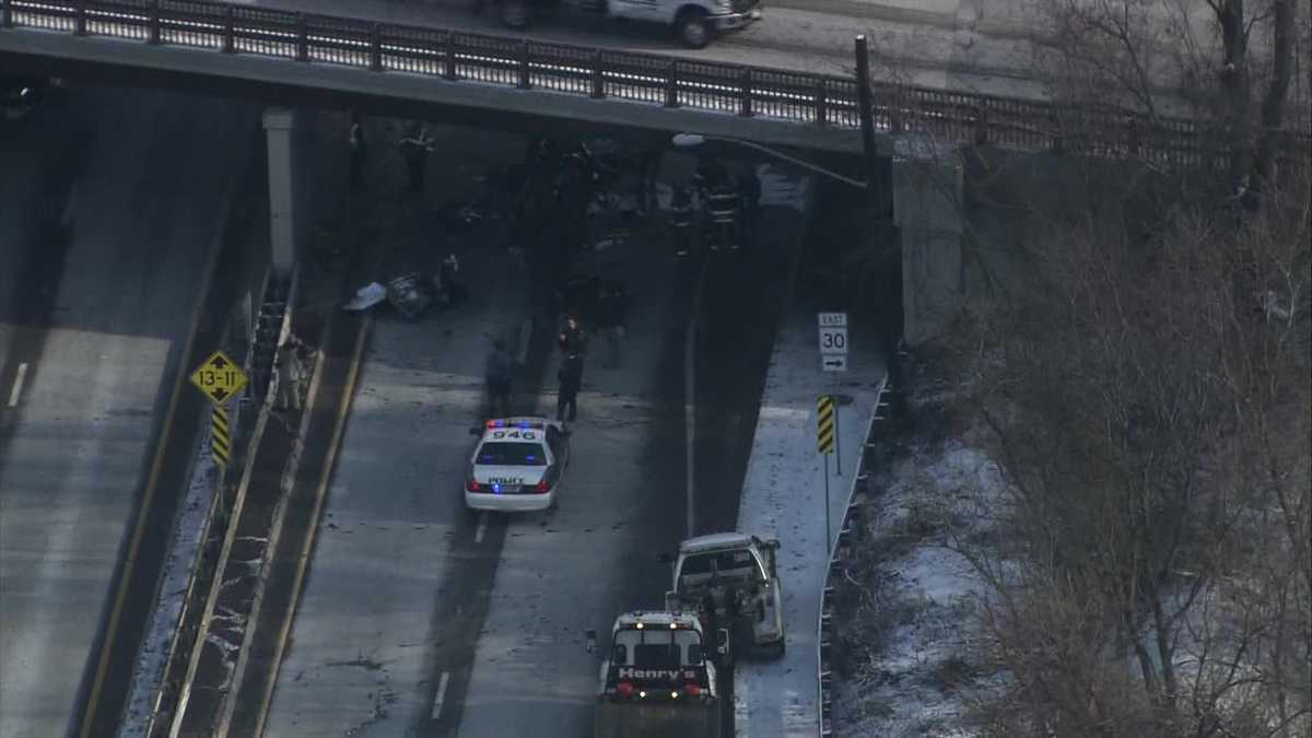 Car carrier crashes into bridge on Route 9