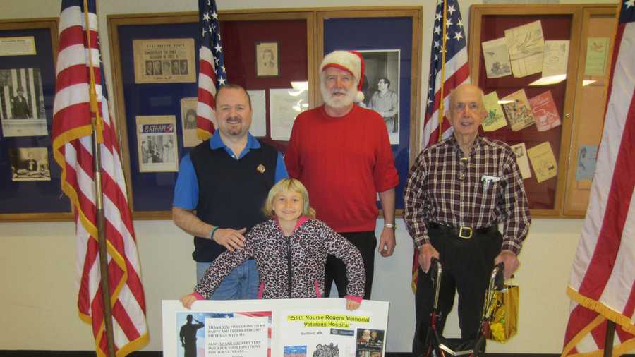Mike and Bethany Gibson with Paul Harrington and  James Burke at the Bedford Veterans Hospital.