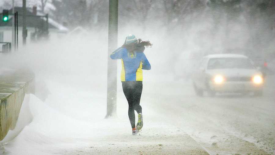 Lauren Donahue, of Marshfield, is resilient to blizzard conditions along Quincy Shore Drive as she trains for the 2014 Boston Marathon, the first where she has an official number, as a major winter storm hit Quincy, Thursday, Jan. 2, 2014.