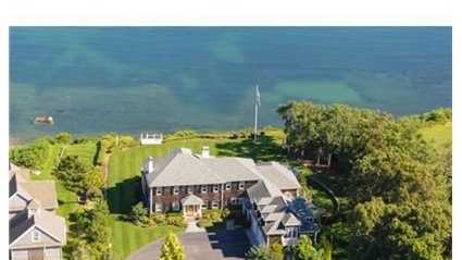 Oceanfront Estate property located on Warren Cove with over an acre of land & private stairs to the water's edge.