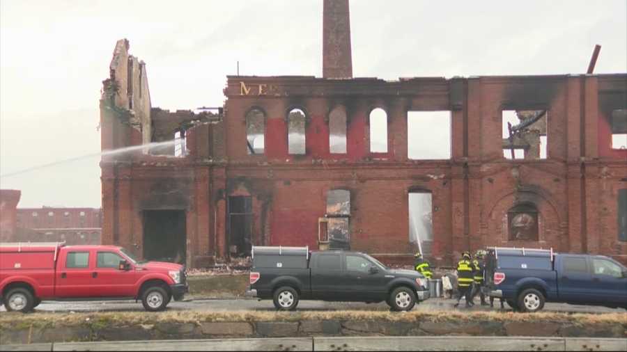 Investigators in Lawrence are preparing to search for evidence after a massive fire consumed an old, closed paper mill in the city.