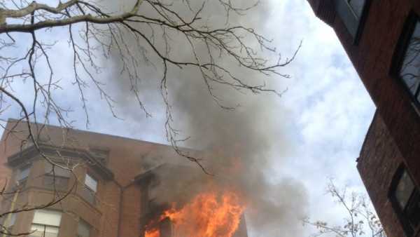 A seven-alarm fire was raging at a six-story apartment building at 31 Mass Ave. in Boston Saturday afternoon.
