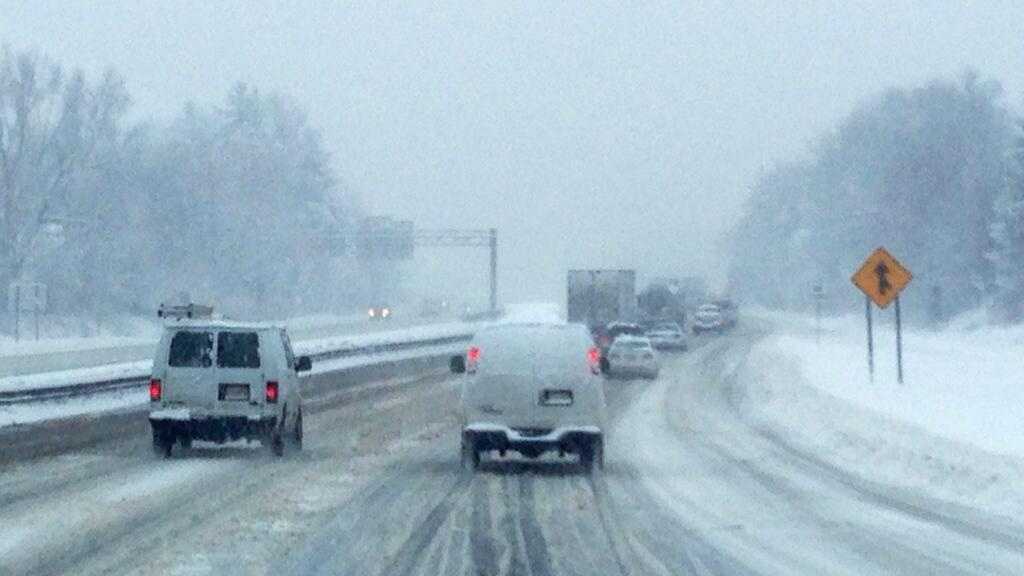 Photos: Heavy snow, hazardous travel