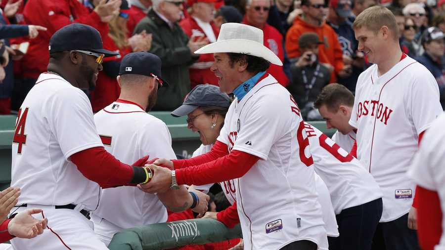 Boston Red Sox's David Ortiz greets Carlos Arredondo, center, and other survivors of the Boston Marathon bombing.