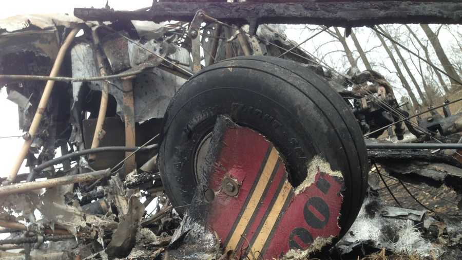 Burned out wreckage of a plane that crashed Friday afternoon on Interstate 89 in Highgate, Vt.
